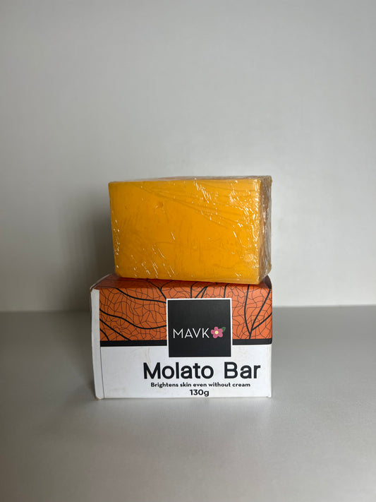 A packaged bar of Molato Lightening Bar Soap with the MAVK brand logo and product information visible on the packaging.